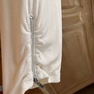 CHICOS ~ Travelers pants with ankle zipper detail. Very cute and very comfy